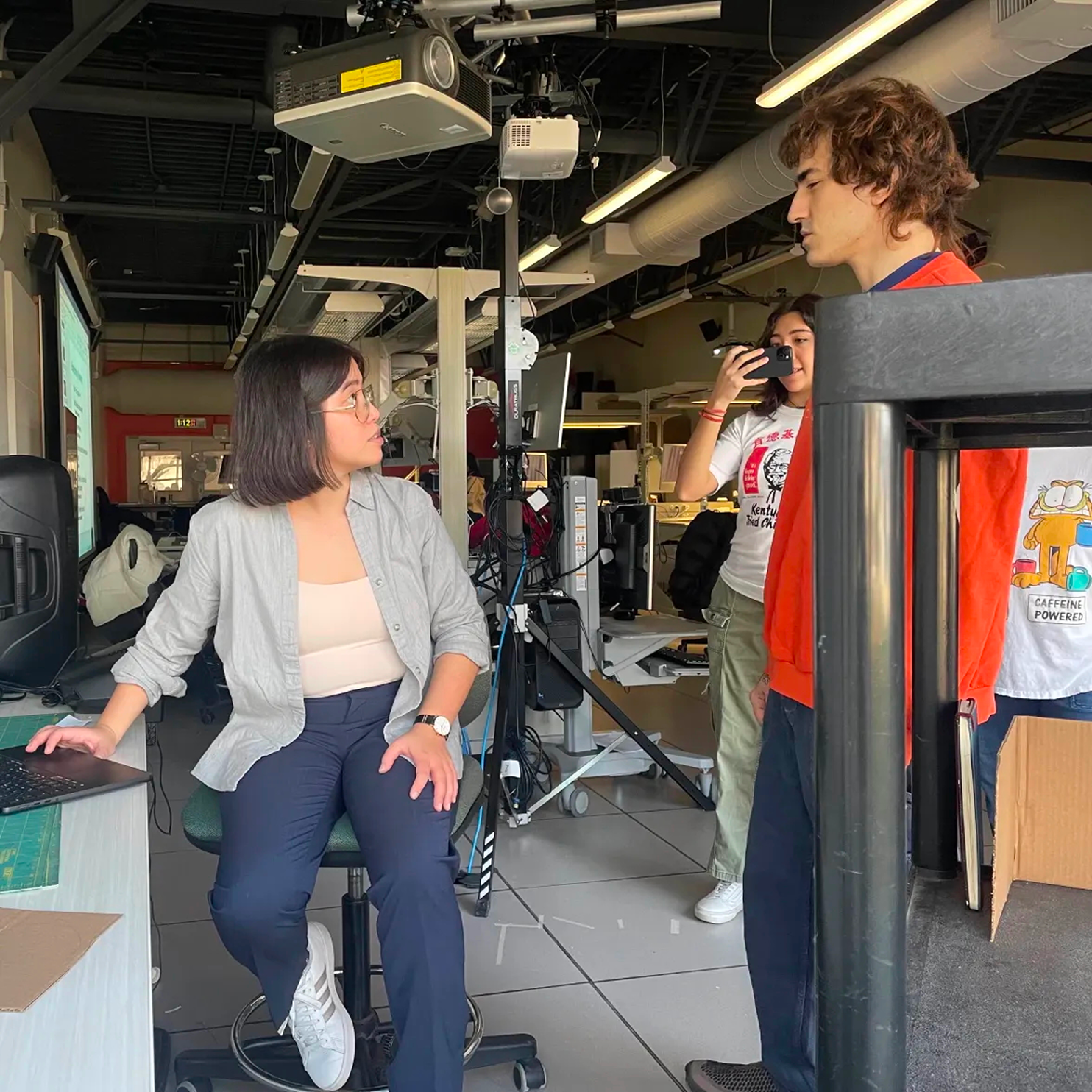 <b>Acting it out:</b> Here I played the role of a librarian helping out a patron simulating a disability (in this case, a visual impairment).